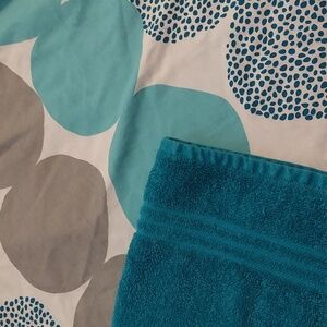 Teal Patterned Shower Curtain and Hand Towel